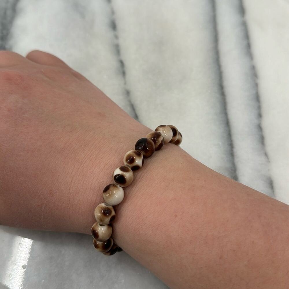 Brown and white beaded stretchy bracelet